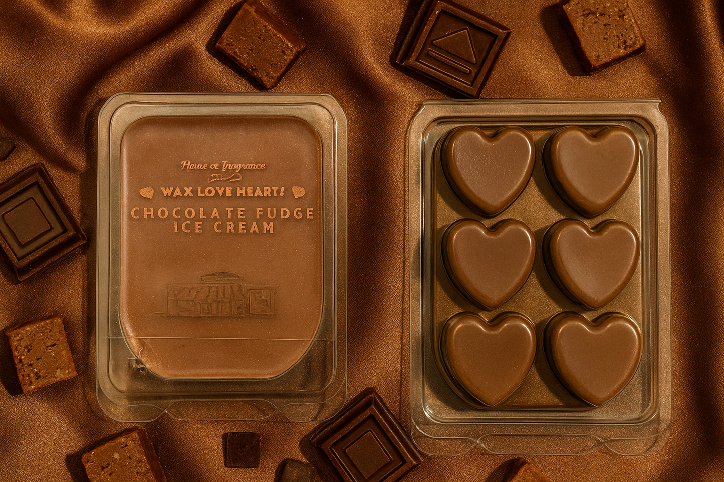 Chocolate coloured, packaged, wax hearts on a brown fabric background