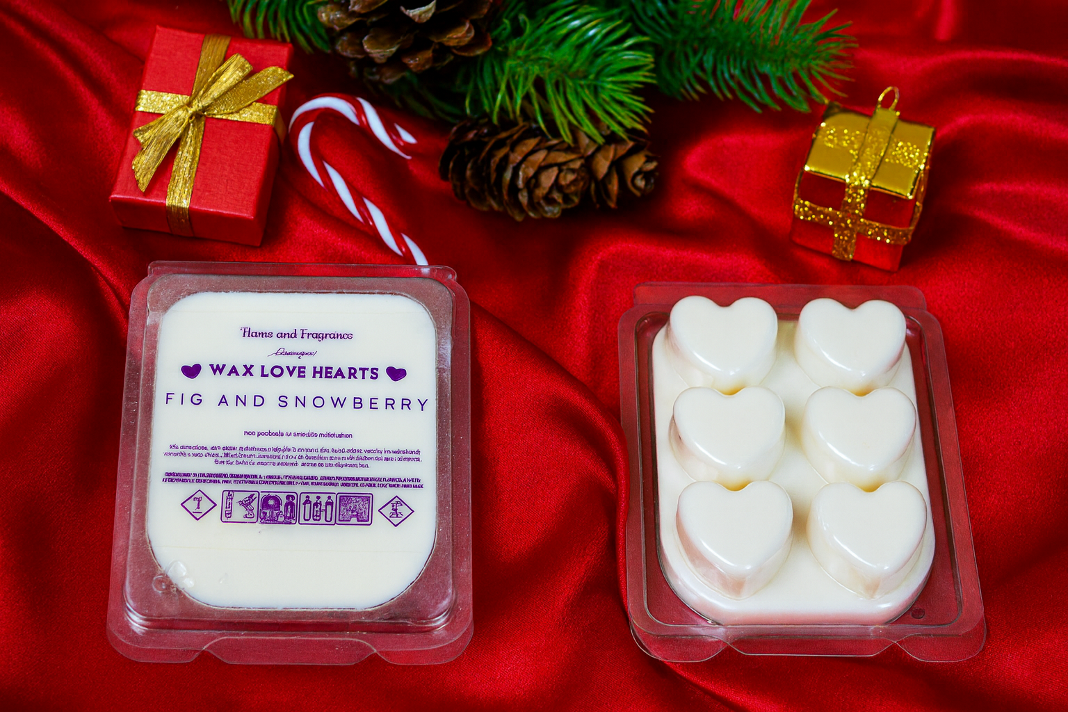 Wax melts in heart shapes with packaging on a red fabric background with Christmas decor.