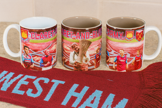 Three mugs with sports team graphics on a West Ham scarf.